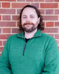 Alex Moore's headshot